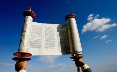 torah_scroll_raised-e1652574059992.jpg
